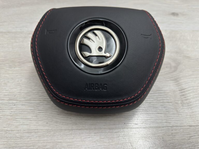 Skórzana poduszka kierowcy z czerwonymi szwami Skoda Enyaq INDYWIAUAL